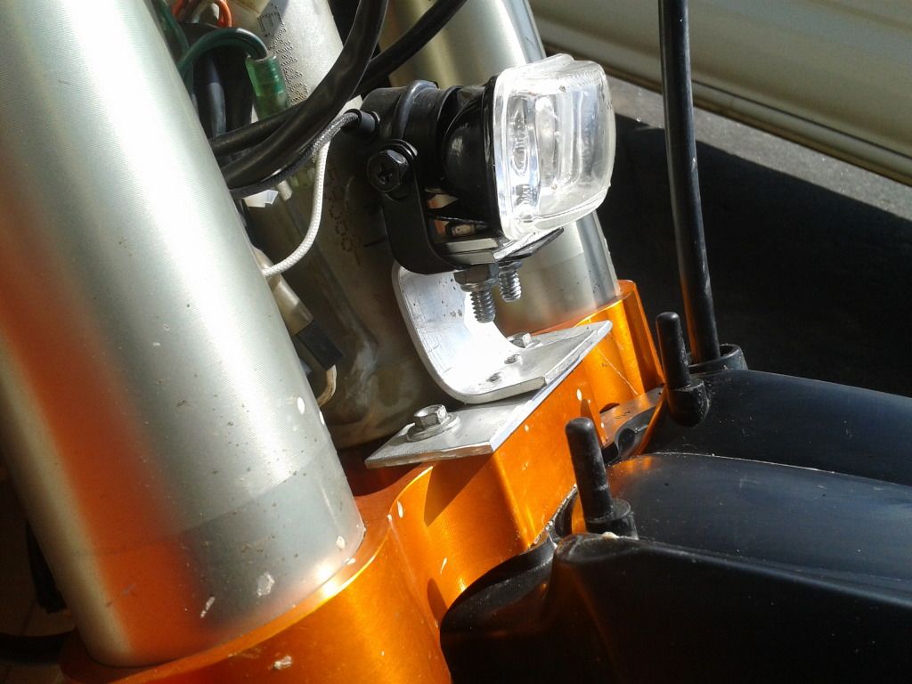 Number plate headlight