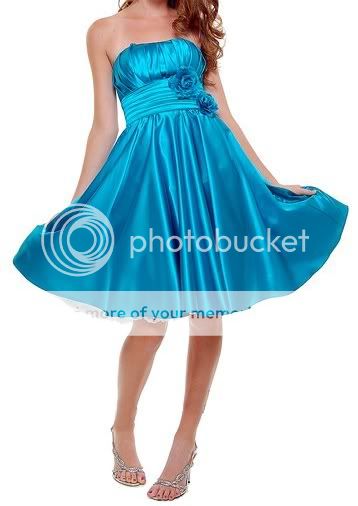   applique along the empire waist. This dress is also classic for as a